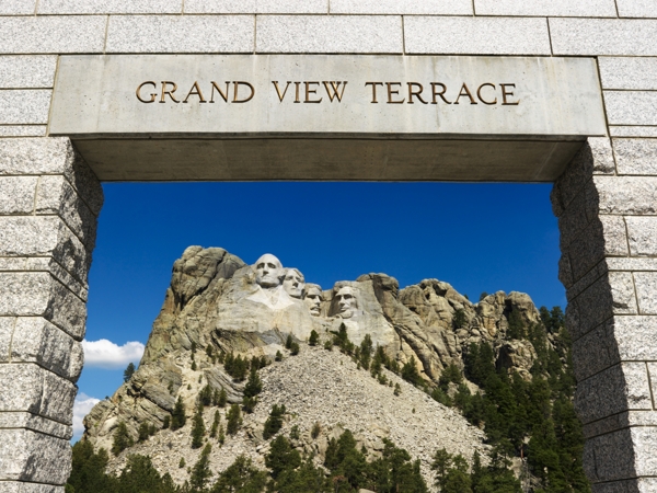 Who are the four faces of Mt. Rushmore?