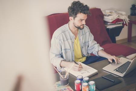 Man working at home using laptop