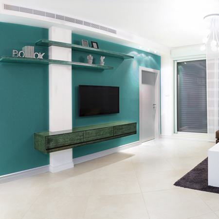 TV Set On Teal-colored Wall