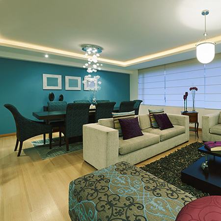 Living Room With Teal-colored Wall