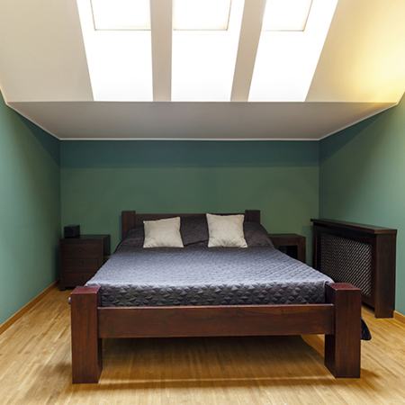 Bedroom With Teal-colored Wall