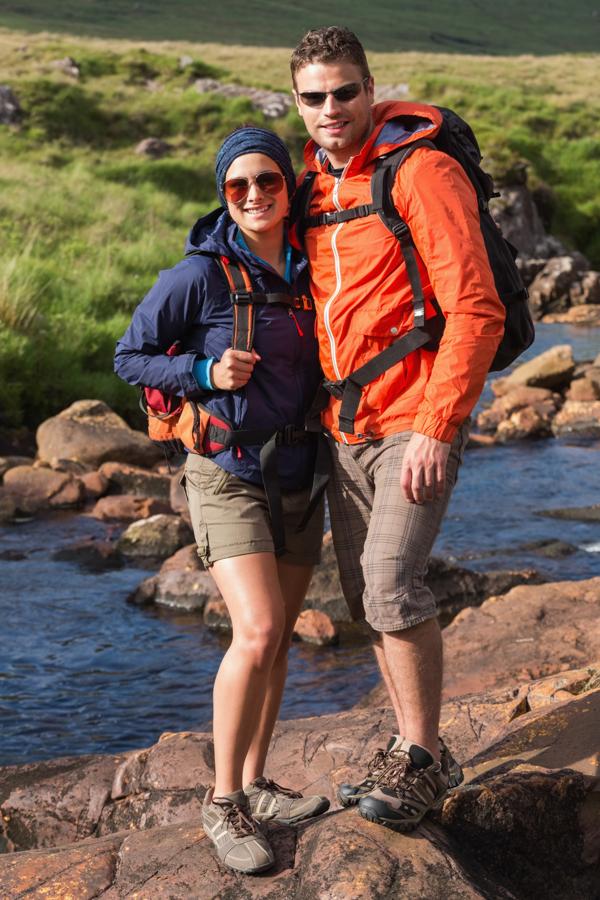 Smiling couple on a hike