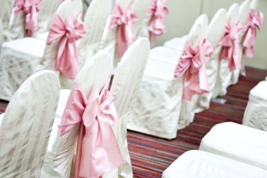 Pink Bow On White Chairs