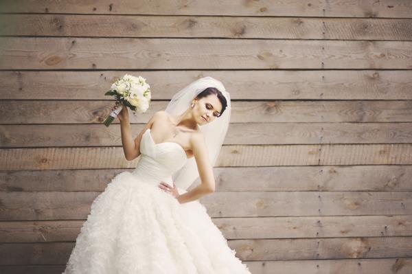 a woman in a sheer corsets wedding dress