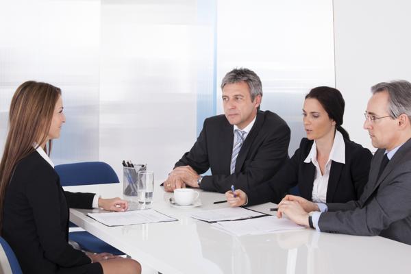Business people interviewing women