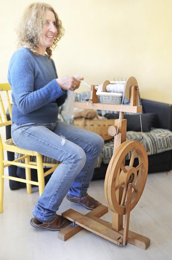 Woman at spinning wheel