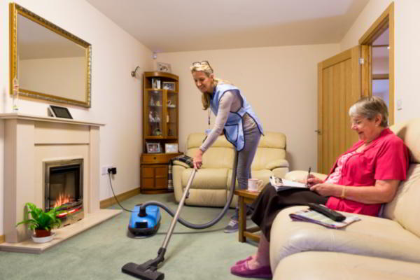 Nurse cleaning home