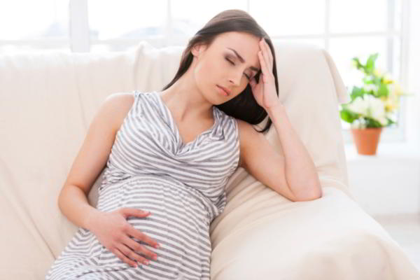 Pregnant Woman suffering from headache