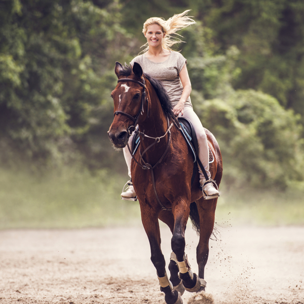 Practicing horseback riding