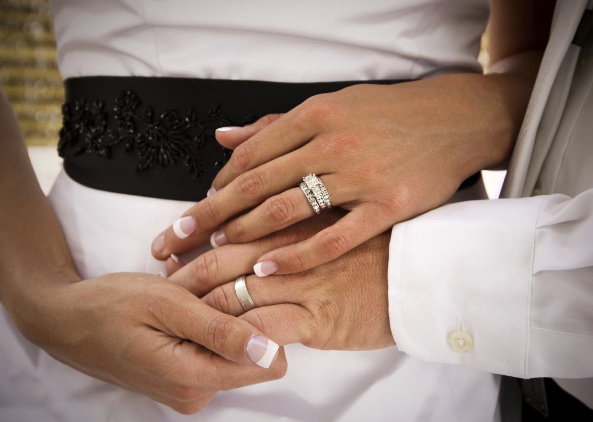 1200 9749894 wedding rings in hands