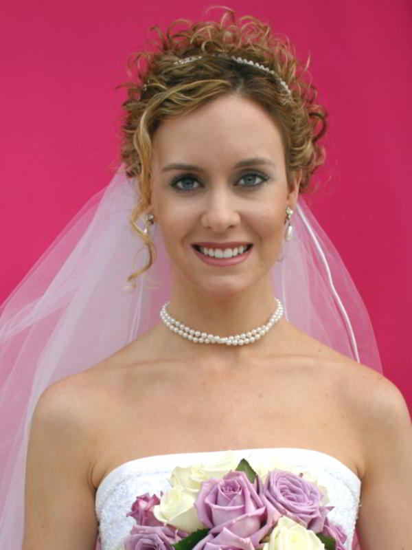 Mantilla veil with pearl jewelry